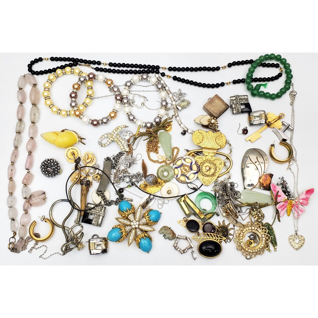 Bag Lot of Costume Jewelry: Bag Lot of Costume Jewelry. Condition: As is. Dimensions: Various Sizes. Provenance: From a Long Island, NY Home. Please note the absence of a Condition Report does not imply that there are no