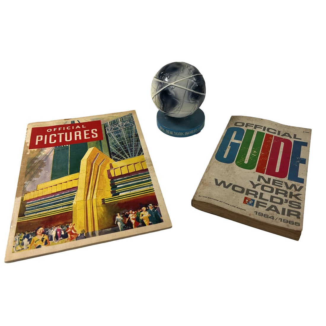 Lot of 3 Vintage World's Fair Items: Lot of 3 Vintage World's Fair Items Including a 1933 Official Picture Book from the Chicago World's Fair Along w/ a 1964-1965 "Unisphere" Bobblehead and Official Guide Book from the New York World's F