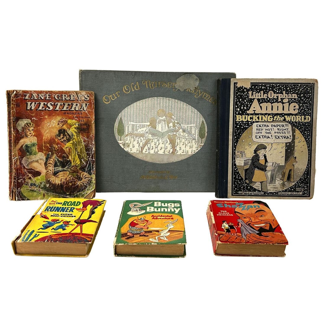 Lot of Old Children's Books: Lot of Old Children's Books Including Our Old Nursery Rhymes, Little Orphan Annie, and 3 Big Little Books. Along w/ a 1950 Copy of Zane Grey's Western Magazine. Condition: All Have Signs of Wear & Tea