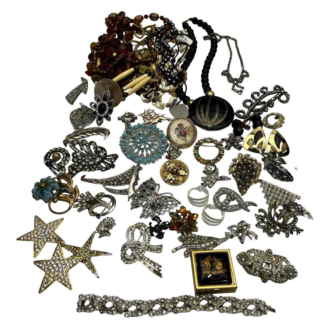 Bag Lot of Costume Jewelry: Bag Lot of Costume Jewelry. Condition: As Found. Dimensions: Various Sizes. Provenance: From a Long Island, NY Home. Please note the absence of a Condition Report does not imply that there are no cond
