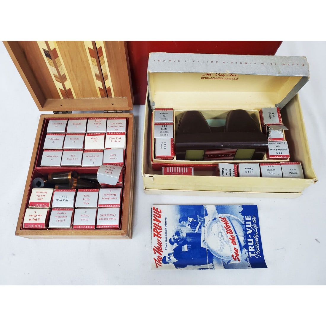 Vintage Tru-Vue 3D Filmstrip Viewer: Vintage Tru-Vue 3D Filmstrip Viewer (Stereoscope) In Original Box Along w/ Many Film Strips Including The Ringling Bros Circus. All In A Metal Carrying Case. Condition: Sold As Is. Dimensions: Various