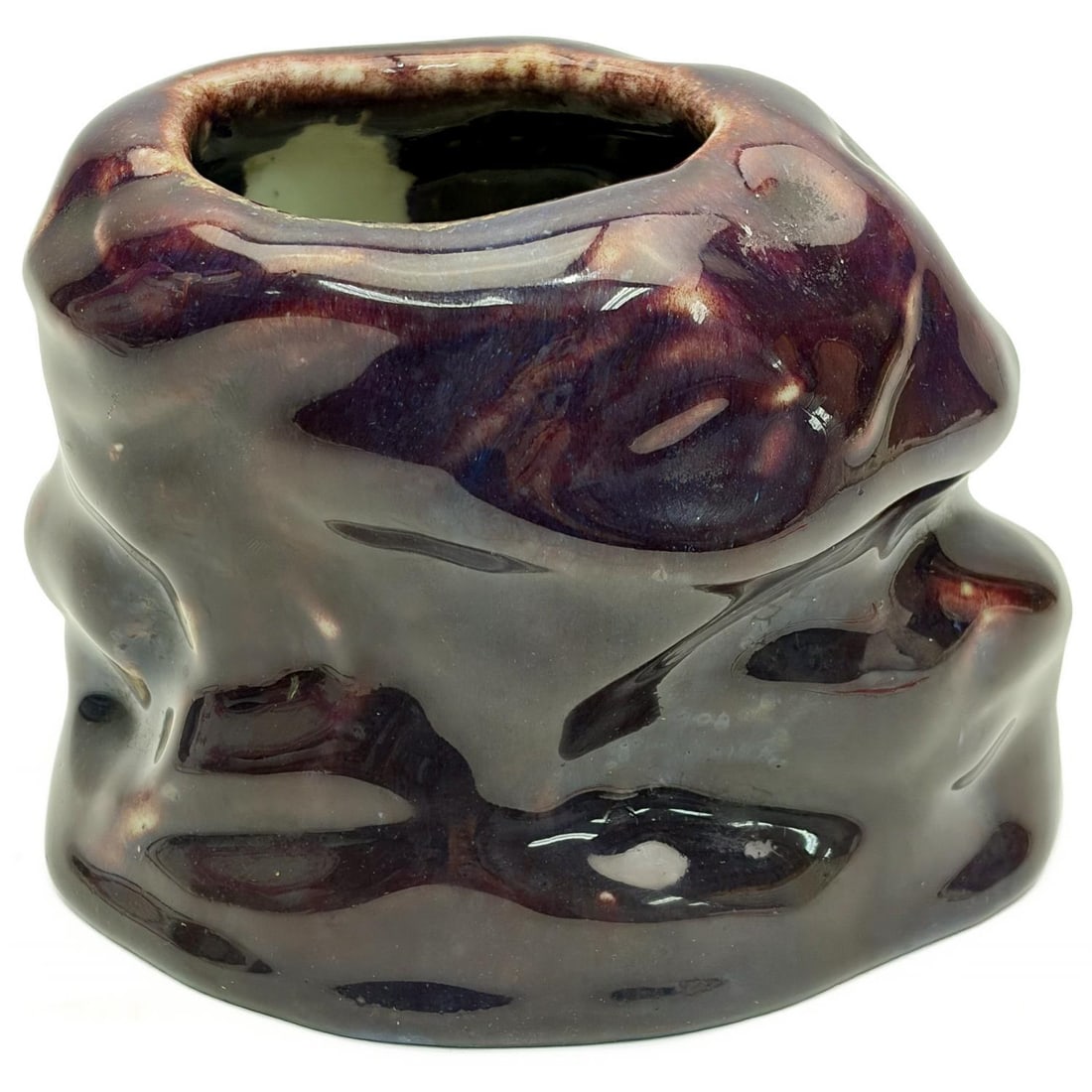 Chinese Purple Glaze Porcelain Vessel: Chinese Purple Glazed Porcelain Vessel. Condition: Generally Good. Dimensions: H-4" x L-5.5". Provenance: From a Long Island, NY Home. Please note the absence of a Condition Report does not imply