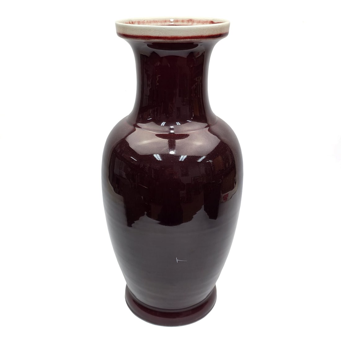 Chinese Oxblood Sang De Boeuf Pottery Tall Vase: Chinese Oxblood Sang De Boeuf Pottery Tall Vase. Condition: Generally Very Good. Dimensions: H-17.5". Provenance: From a Long Island, NY Home. Please note the absence of a Condition Report does not im