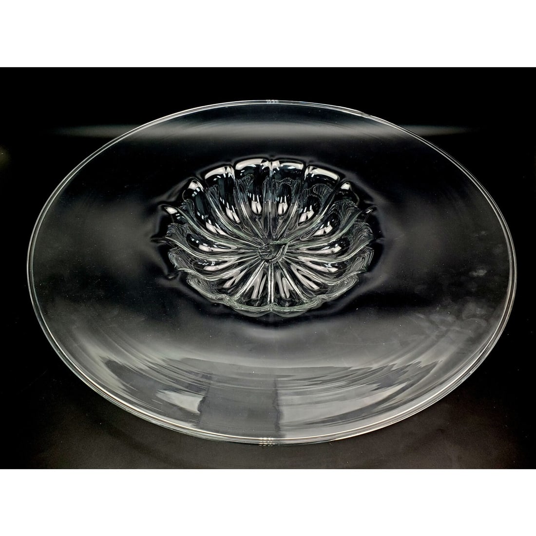 Large Hand Blown Glass Centerpiece: Large Hand Blown Glass Centerpiece. Condition: Generally Very Good. Dimensions: Dia-23.5" x H-3.5". Provenance: From a NYC Apartment. Please note the absence of a Condition Report does not imply that 