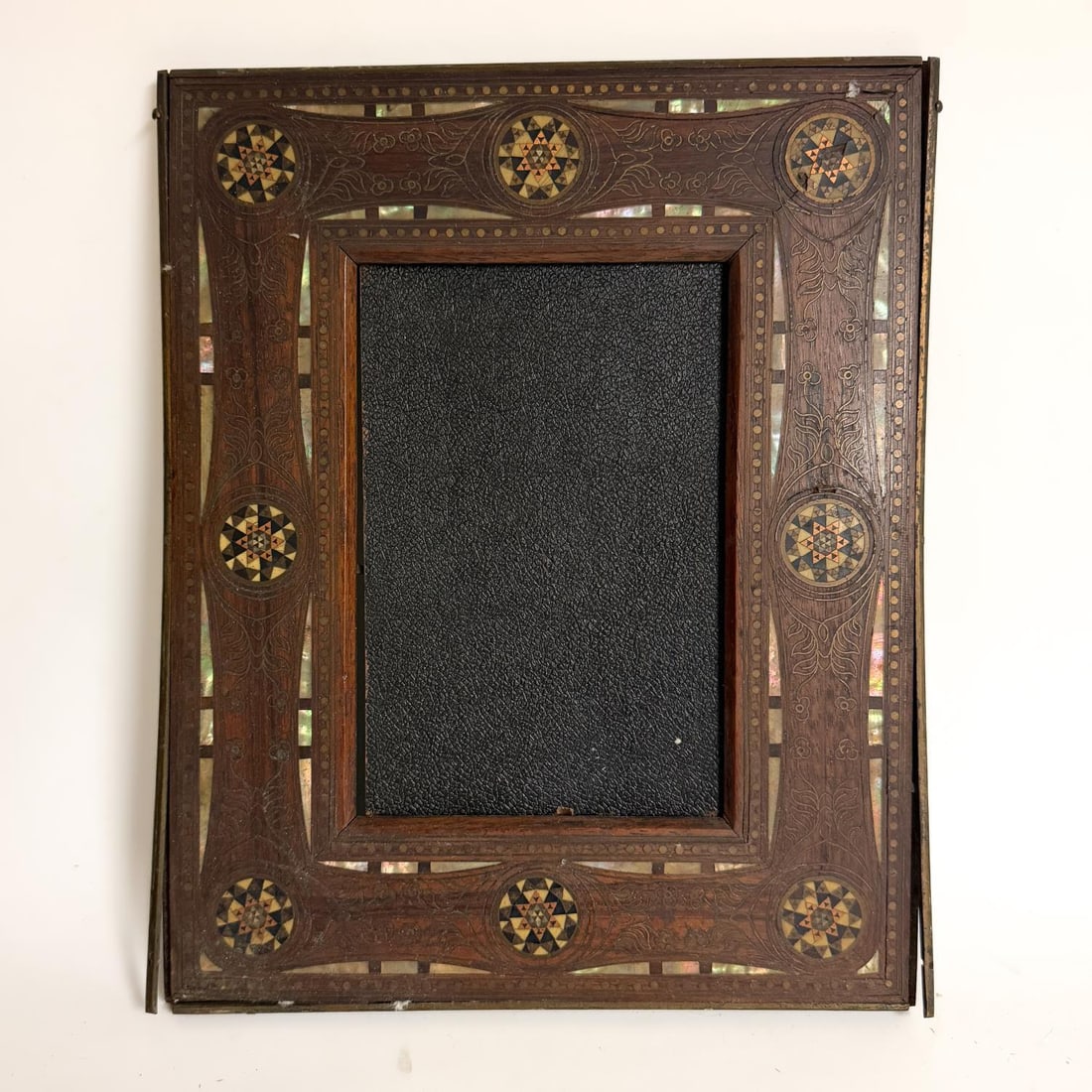 Unusual Old Islamic Marquetry & Inlaid Brass Frame: Unusual Old Islamic Marquetry & Inlaid Brass Wooden Frame w/ Wire Decorations & Easel Back. Condition: Sold As Is w/ Losses & Separations. Dimensions: 10" x 8". Provenance: From a Long Island, NY