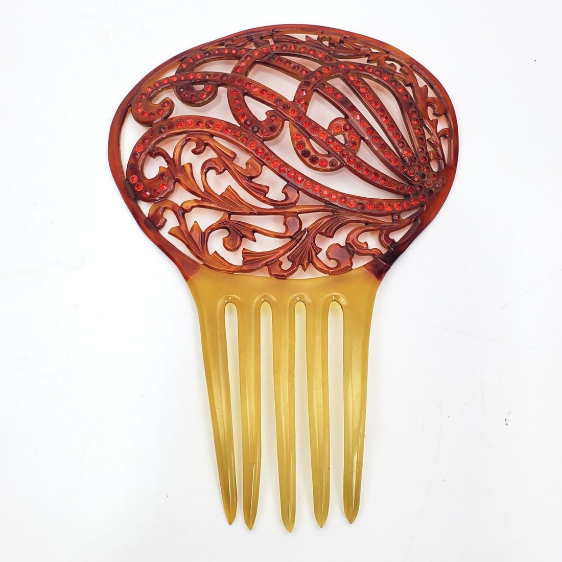 Vintage Bakelite Large Comb: Vintage Bakelite Large Comb. Condition: Generally Very Good. Dimensions: H-8" x W-5.5". Provenance: From a Long Island, NY Home. Please note the absence of a Condition Report does not imply that there