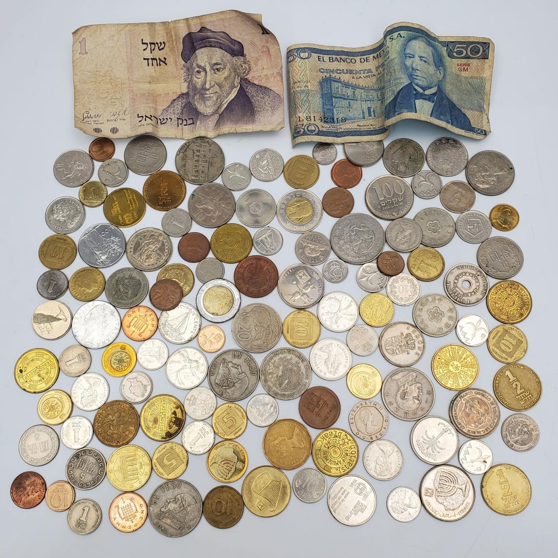 Bag Lot of Old Coins & Notes: Bag Lot of Old Coins & Notes. Condition: Generally Good. Dimensions: Various Sizes. Provenance: From a Long Island, NY Home. Please note the absence of a Condition Report does not imply that there are