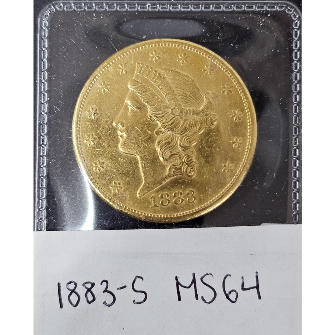 1883-S Liberty Head $20 Gold Double Eagle Coin: 1883-S Liberty Head $20 Gold Double Eagle Coin with Approximate Grading of MS64. From San Francisco Mint. Condition: Generally Good. Provenance: From a Long Island, NY Home. Please note the absence of