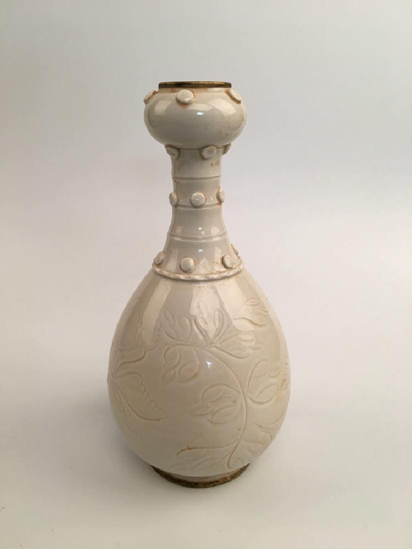 Chinese Ding Yao Porcelain Bottle: Chinese Ding Yao Porcelain Bottle 12" H X 5-1/4" W, 2 Lbs Shipping: We are able to pack and ship this item to an address in the United States for $30.00 via UPS Ground or USPS Priority Mail. Tracking