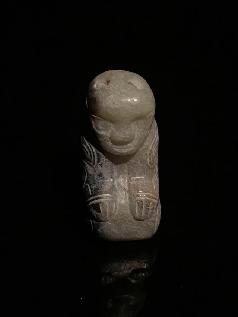 Chinese Western Zhou Jade Man In Prayer: Chinese Western Zhou Jade Man In Prayer 1.75" L x 15mm W, 1.99 oz Shipping: We are able to pack and ship this item to an address in the United States for $30.00 via UPS Ground or USPS Priority Mail. T