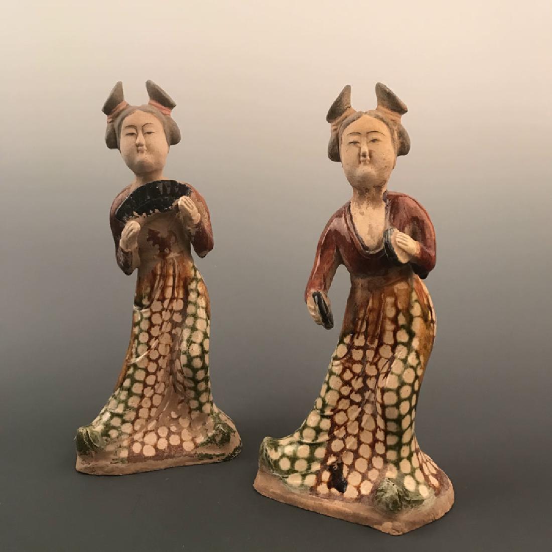A Pair Tang San Cai Pottery Statue carved Beautiful: A Pair Tang San Cai Pottery Statue carved Beautiful woman Play Musical instrument 12" H X 5" W, 4.4 Lbs Shipping: We are able to pack and ship this item to an address in the United States for $40.00 v