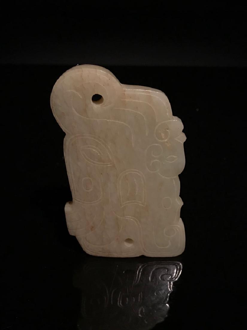 Chinese Western Zhou White Jade Pendant: Chinese Western Zhou White Jade Pendant 3 3/8" H x 2" W, 3.12 oz Shipping: We are able to pack and ship this item to an address in the United States for $30.00 via UPS Ground or USPS Priority Mail. Tr