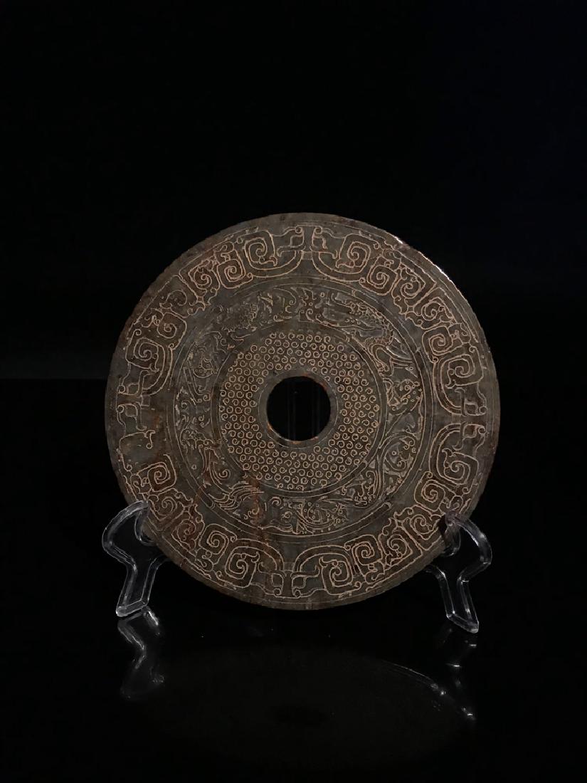 Chinese Han Dynasty Green Hade Bi Disc: Chinese Han Dynasty Green Hade Bi Disc D 7", 0.8 lb Shipping: We are able to pack and ship this item to an address in the United States for $35.00 via UPS Ground or USPS Priority Mail. Tracking inform