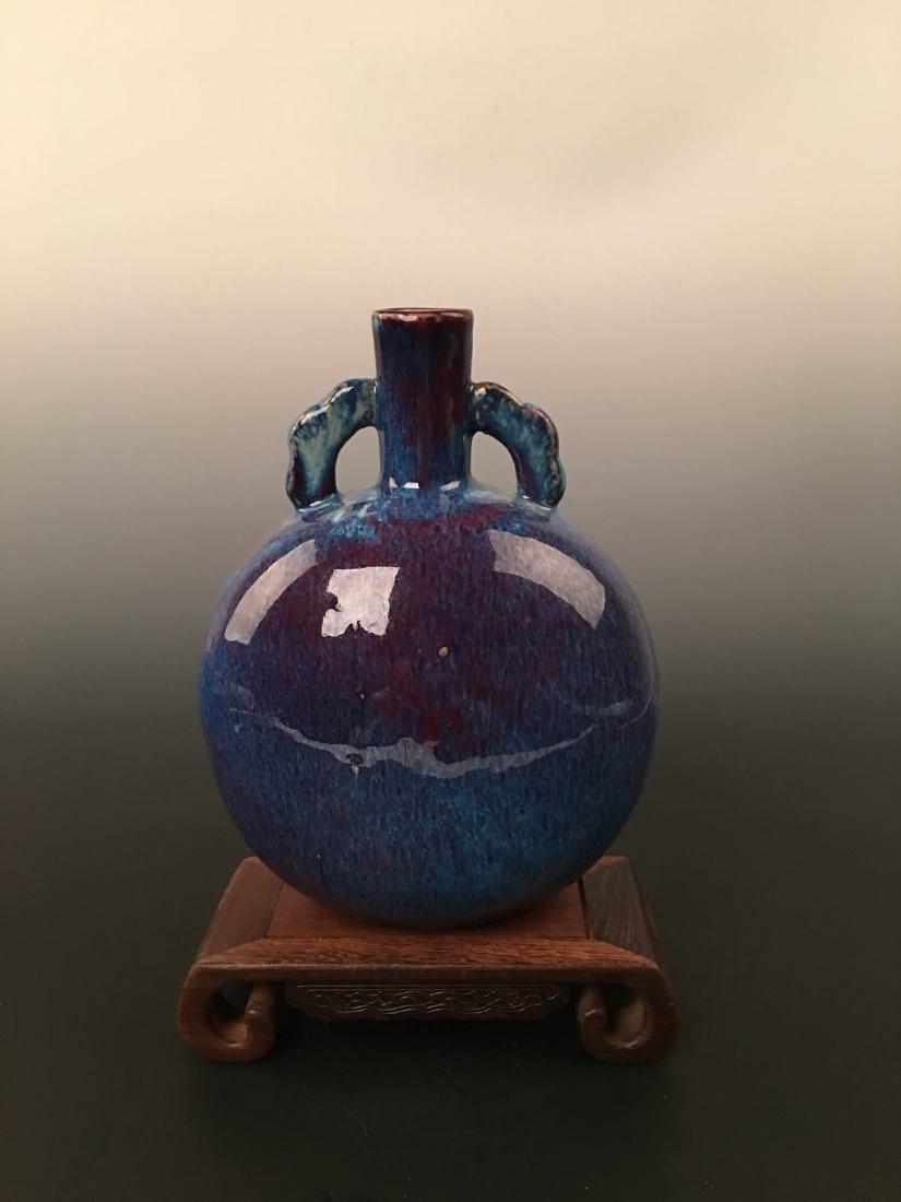 Flambe-Glazed Moon Flask Vase: Flambe-Glazed Moon Flask Vase 10-1/2" H X 7-1/4" W , 3.8 Lbs Shipping: We are able to pack and ship this item to an address in the United States for $30.00 via UPS Ground or USPS Priority Mail. Tracki