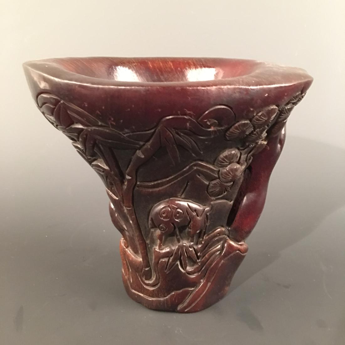 Chinese Ox-Horn Wine Cup, Qianlong Mark: Chinese Ox-Horn Wine Cup, Qianlong Mark 5-3/4'' H, 6-1/4'' W; 2.2 lb Shipping: We are able to pack and ship this item to an address in the United States for $30.00 via UPS Ground or USPS Priority Mail