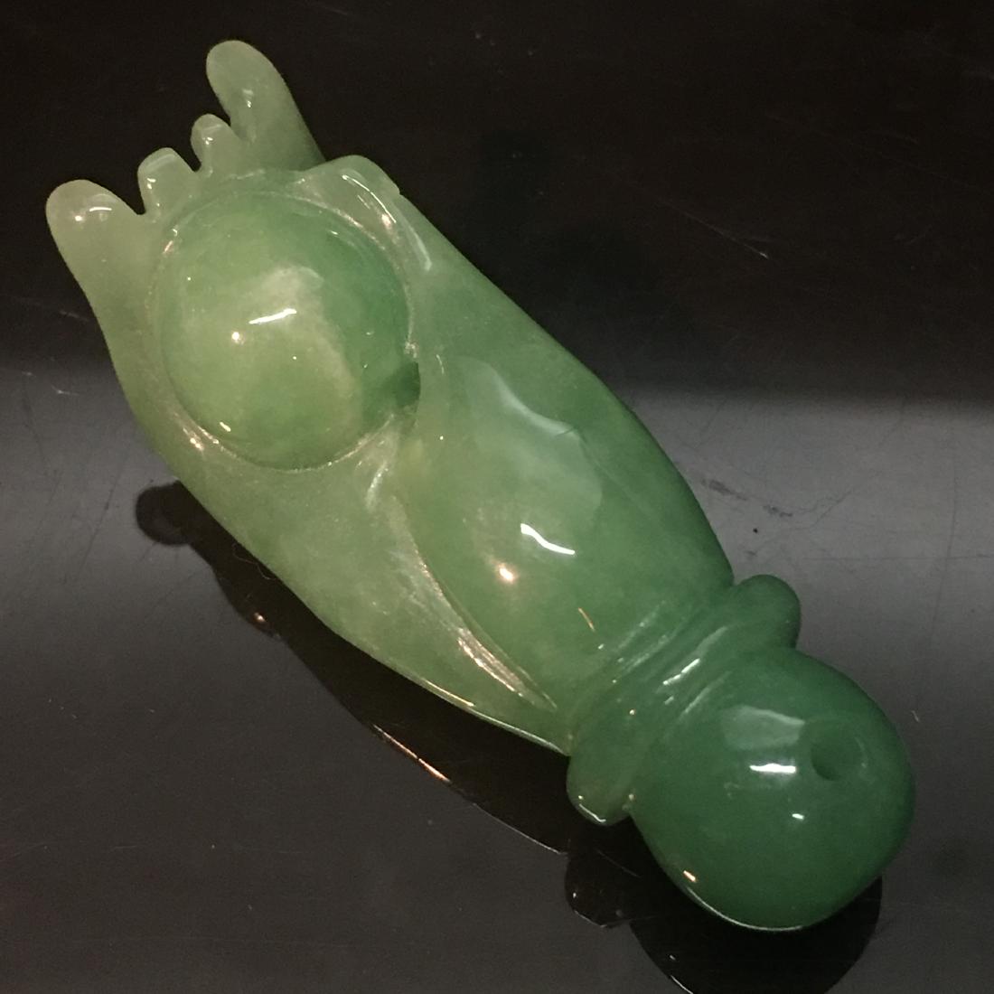 Chinese Green Jade Figure: Chinese Green Jade Figure 1/2'' H, 1-1/2'' W; 17 g Shipping: We are able to pack and ship this item to an address in the United States for $25.00 via UPS Ground or USPS Priority Mail. Tracking informa