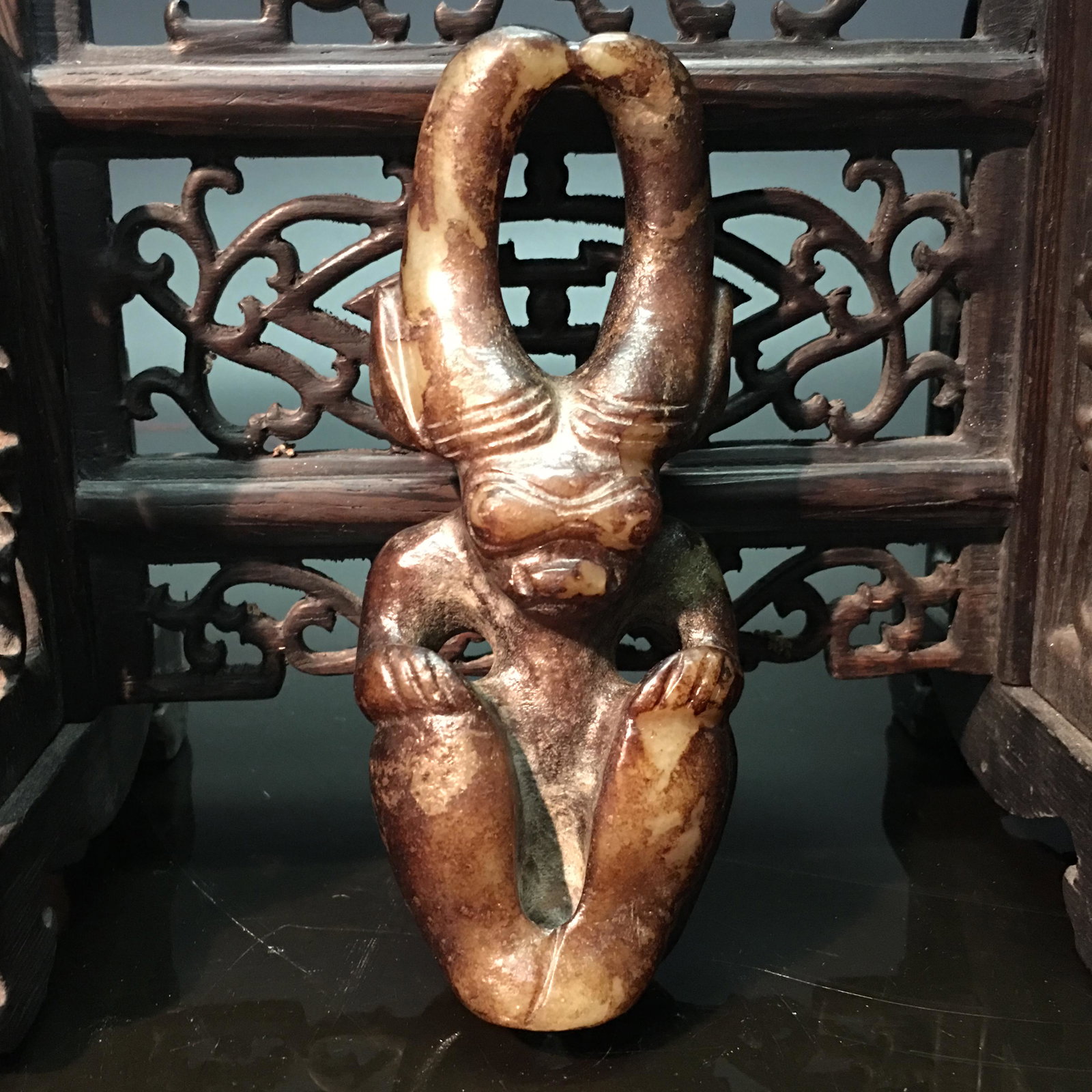 Chinese Hongshan Jade Figure: Chinese Hongshan Jade Figure 4-3/4'' H, 2'' W; 173 g Shipping: We are able to pack and ship this item to an address in the United States for $30.00 via UPS Ground or USPS Priority Mail. Tracking infor