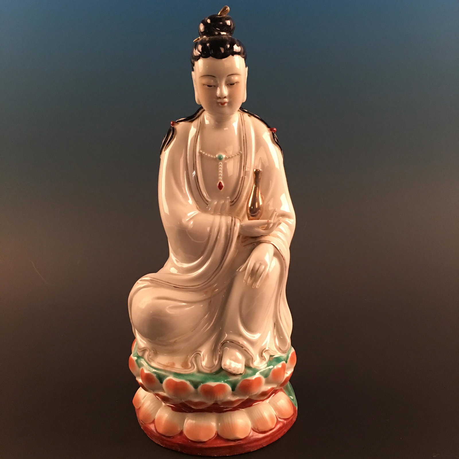 Chinese Porcelain Guanyin: Chinese Porcelain Guanyin 13'' H, 5-1/2'' W; 3.4 lb Shipping: We are able to pack and ship this item to an address in the United States for $45.00 via UPS Ground or USPS Priority Mail. Tracking inform