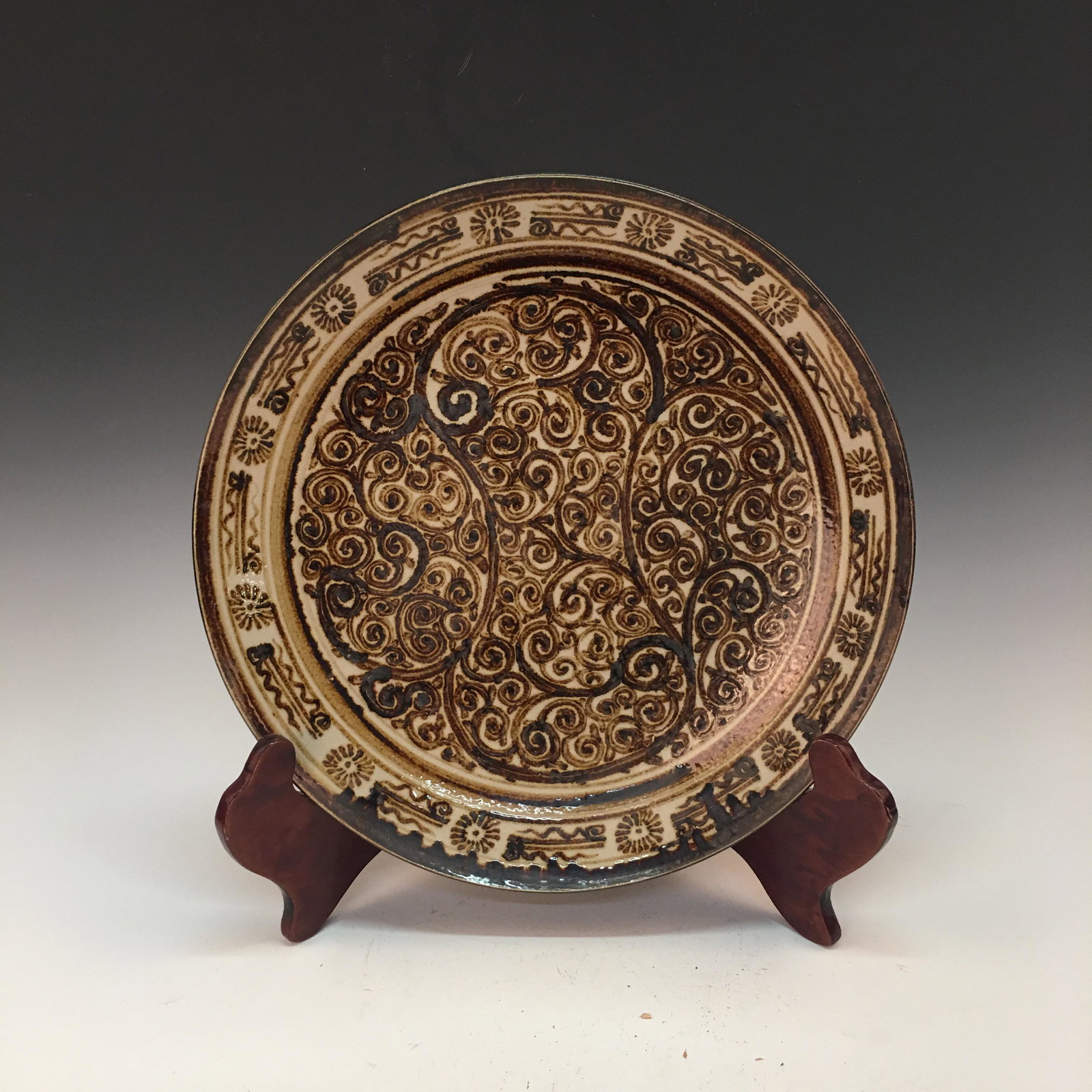 Chinese Cizhou Kiln Plate: Chinese Cizhou Kiln Plate 2'' H, 13-1/4'' W; 3.8 lb Shipping: We are able to pack and ship this item to an address in the United States for $45.00 via UPS Ground or USPS Priority Mail. Tracking inform