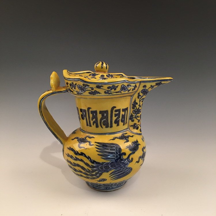 Chinese Blue and Yellow Phoenix Pitcher: Chinese Blue and Yellow Phoenix Pitcher with Xuande Mark 9-1/2" H X 10" Diam, 4 Lbs Shipping: We are able to pack and ship this item to an address in the United States for $30.00 via UPS Ground or USP