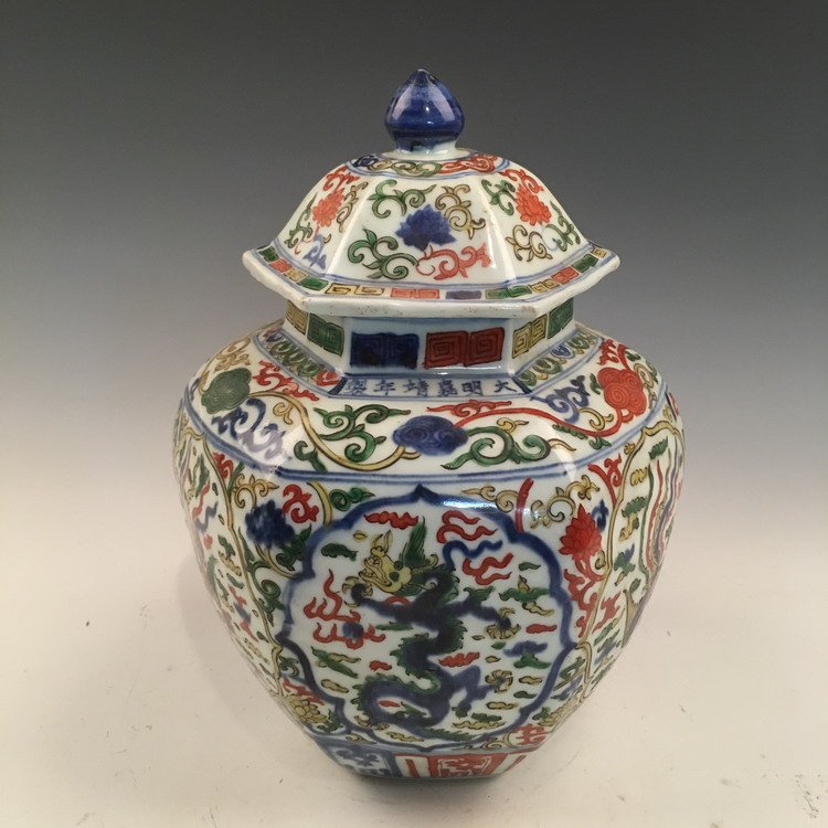Jiajing Mark, Chinese Wucai Dragon Jar: Chinese Wucai Dragon Jar with Jiajing Mark 12" H X 8-1/2" Diam., 5.8 Lbs Shipping: We are able to pack and ship this item to an address in the United States for $40.00 via UPS Ground or USPS Priority 