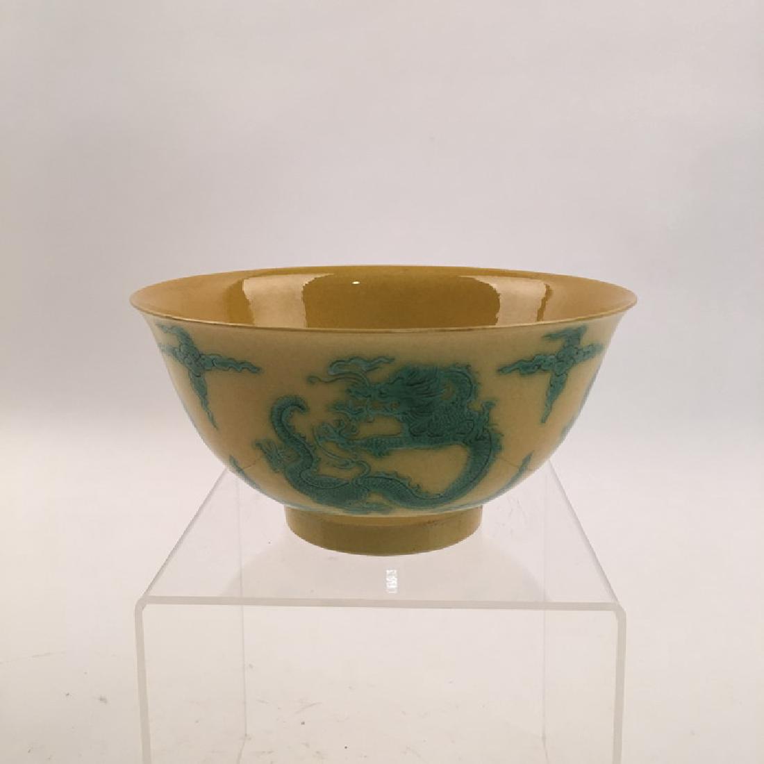 Chinese Yellow Glazed Bowl with Green Dragon: Chinese Yellow Glazed Bowl with Green Dragon. Kuangxi Mark 3"H X 6" Diam., 0.4 Lbs Shipping: We are able to pack and ship this item to an address in the United States for $30.00 via UPS Ground or USPS