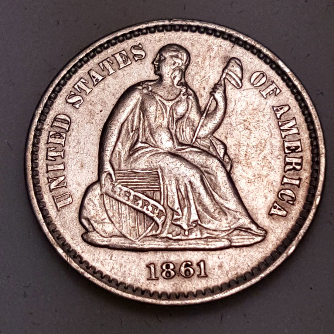 1861 1/2 DIME AU (1 of 2)