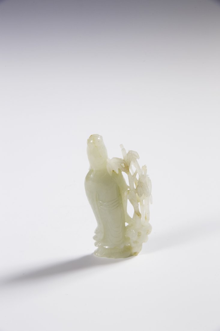 A Chinese jade Guanyin with original stand (1 of 6)
