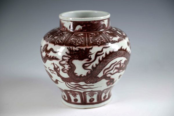 A CHINESE EARLY MING UNDER-GLAZED COPPER RED PORCELAIN: DIAMETER: 8"