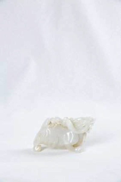 A CHINESE WHITE JADE LION (1 of 4)