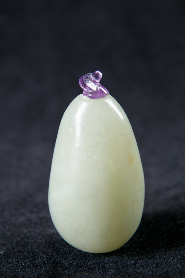 A CHINESE CELADON JADE SNUFF BOTTLE, 19TH CENTURY (1 of 10)