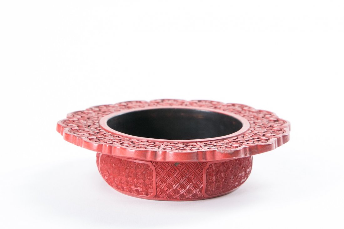 A CHINESE CINNABAR LACQUER DISH WITH FLORAL, QING (1 of 10)