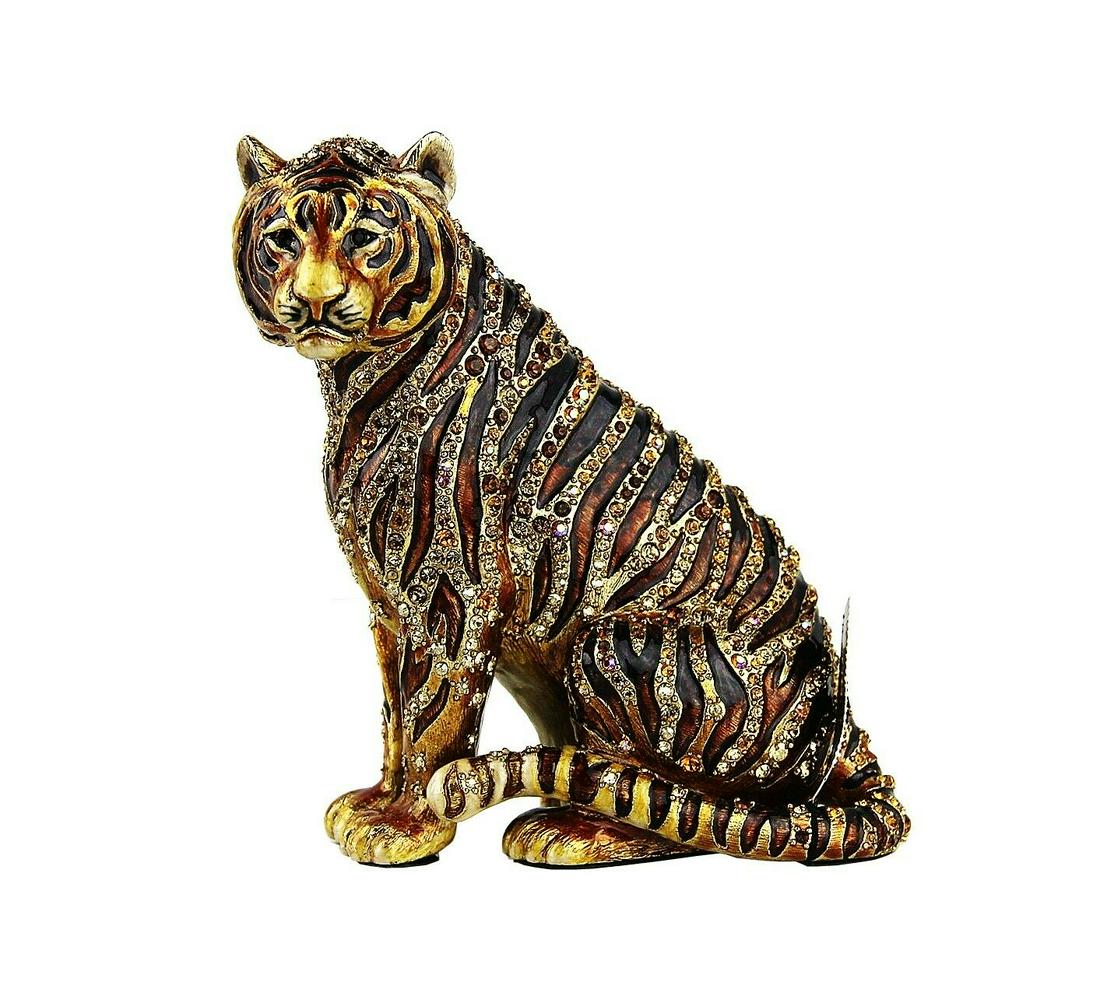 JAY STRONGWATER JUNGLE PARKER SITTING TIGER FIGURINE: JAY STRONGWATER From JUNGLE Collection SITTING TIGER FIGURINE Name: Parker Handpainted Enamel over metal Hand-set Swarovski Crystals. This is New Model With Iridescent Crystals 2 1/2" Wide x 4 1/2" De