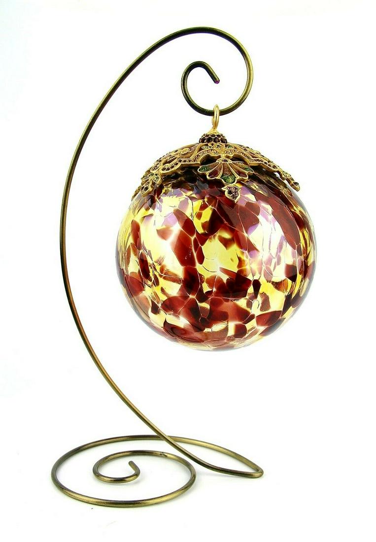 JAY STRONGWATER CHRISTMAS ORNAMENT BALL LARGE CHOCOLATE: JAY STRONGWATER LARGE Glass Ball Ornament & StandColor: CHOCOLATE & GOLDThe Ball is 4.5" in Diameter and 5" HighHandcrafted ornament in the European traditionIncludes a standSo you can display it on a