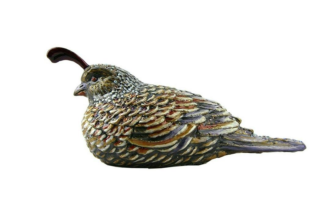 JAY STRONGWATER MEADOW FRIDA SITTING QUAIL FIGURINE: JAY STRONGWATERSITTING QUAIL FIGURINEFrom MEADOW CollectionName: FRIDAColor: FLORAHandpainted Enamel over metalHand-set Multicolor Swarovski Crystals.6.5" Long x 2.5" Tall x 2.25" DeepHandcrafted in U