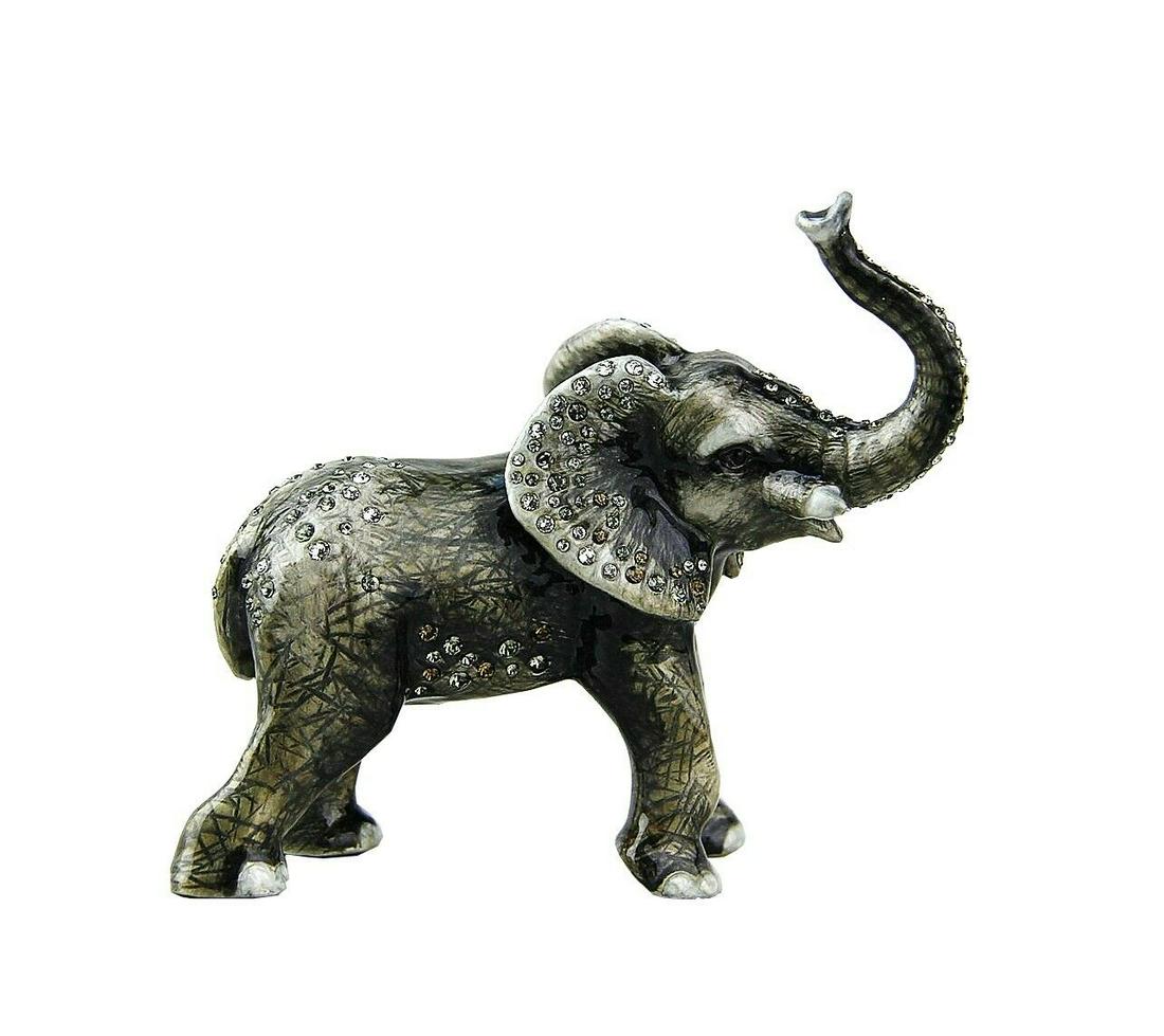 JAY STRONGWATER JUNGLE ELMORE BABY ELEPHANT with: JAY STRONGWATERBABY ELEPHANTThis is the ORIGINAL Production From Rhode IslandHandpainted Enamel over metalHand-set Multicolor Swarovski Crystals.4"Long x 3.25" Tall x 1.75" DeepHandcrafted in USA100% 