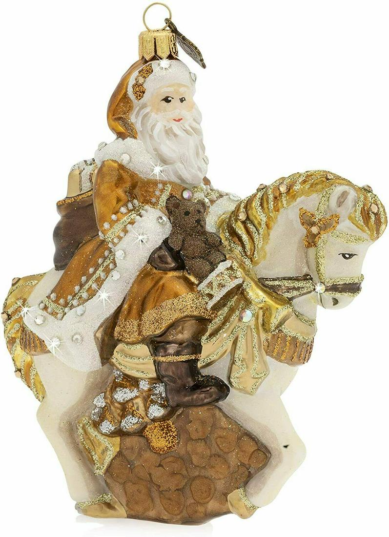 JAY STRONGWATER GOLDEN SANTA ON HORSE GLASS ORNAMENT: JAY STRONGWATER6" GOLDEN SANTA ON HORSE GLASS ORNAMENT6" Tall x 5" Wide x 3" DeepMade of Glass withMulticolor SWAROVSKI CrystalsBRAND NEW, ORIGINAL BOX100% AUTHENTIC GUARANTEED