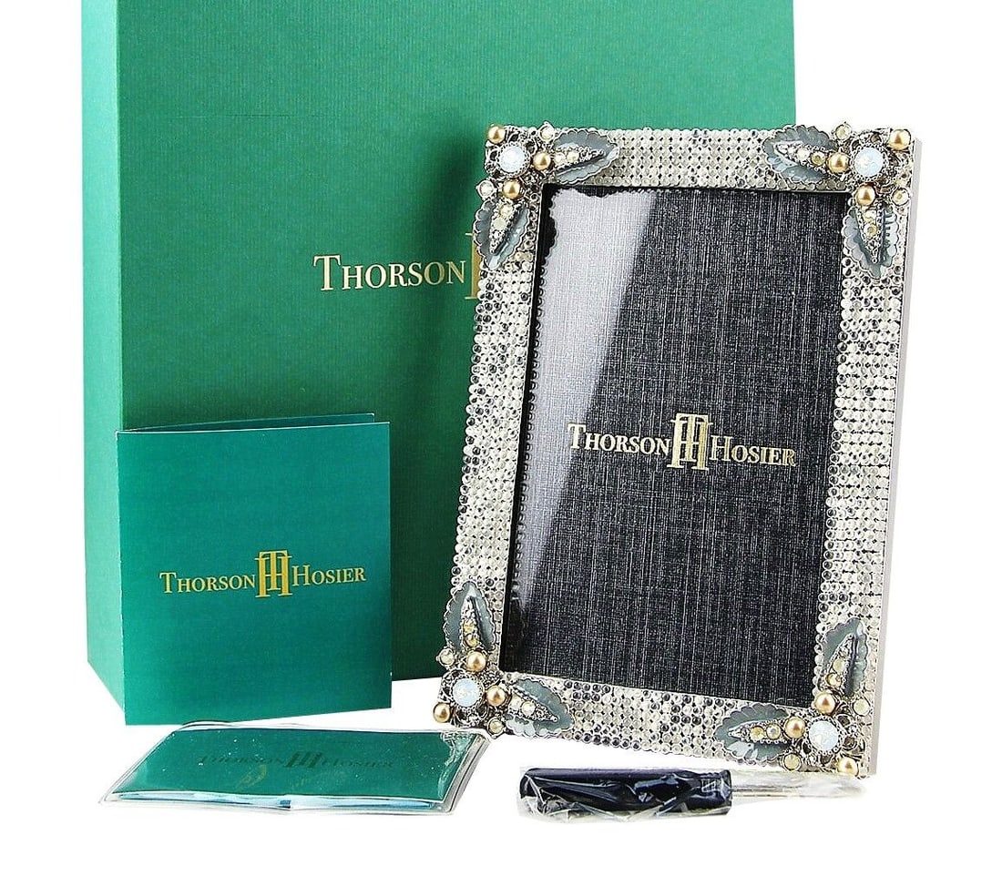THORSON HOSIER 4 x 6 ODIN OPAL FRAME SWAROVSKI: Thorson & HosierAmazing High Quality FrameName: ODINColor: OPALMULTI-COLOR SWAROVSKI CRYSTALS & SEMIPRECIOUS STONESThis is a large frame, will fit 4"x 6" photoThis frame made in USA at the same factor
