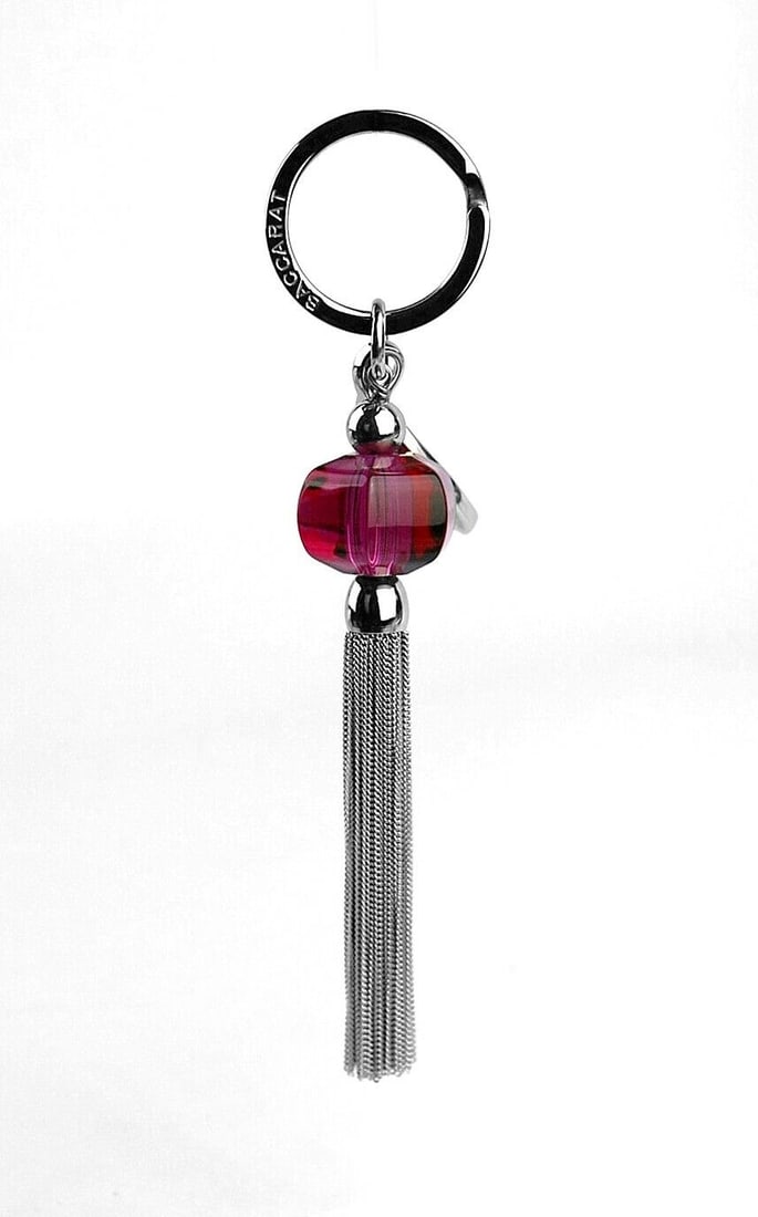 BACCARAT JEWELRY SHERAZADE KEY RING CHAIN CHARM PEONY CRYSTAL: 100% AUTHENTICBACCARATMade in FranceSHERAZADE COLLECTIONPEONY FULL LEAD CRYSTALPlease See ALL Pictures!Crystal: 1" Diameter x 0.71" TallChain: 2.5 LongTotal Length: 5"