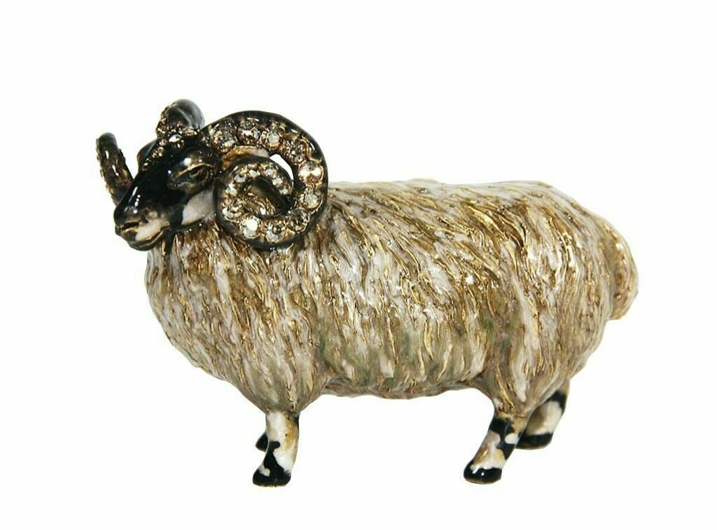 JAY STRONGWATER RAM FIGURINE 3" TALL: JAY STRONGWATERA STUNNING RAM FIGURINEJEWELED WITH SWAROVSKI CRYSTALSFrom the FLORA & FAUNA Collection.Handcrafted in the USAHandpainted Enamel over metalHandset Swarovski Crystals4"Long x 3"H x 2" Wi
