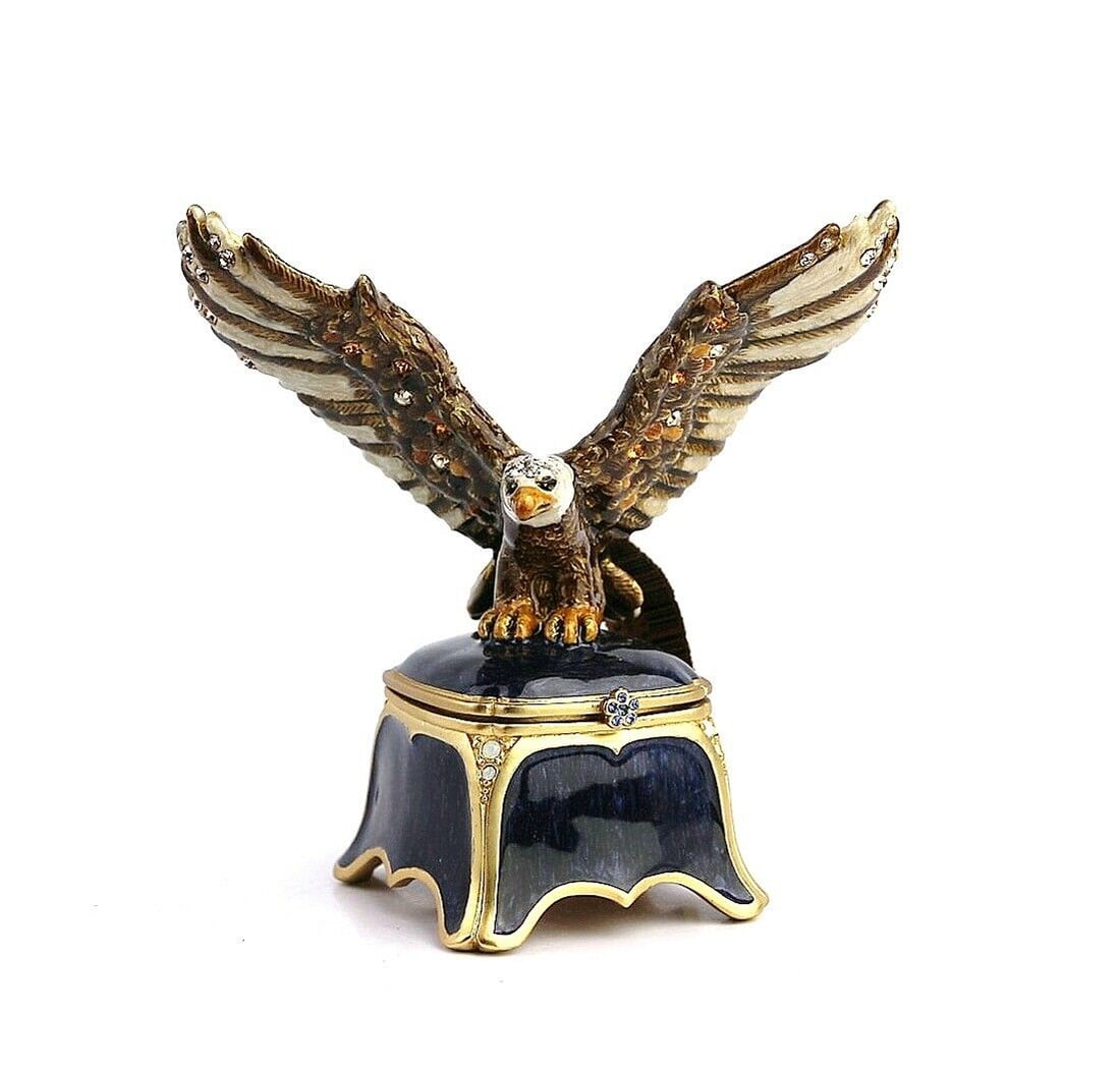 JAY STRONGWATER GORGEOUS DILLON EAGLE TRINKET BOX SWAROVSKI: JAY STRONGWATERAMAZING HIGHLAND EAGLE TRINKET BOXName: DILLONColor: NATURALHandpainted Enamel over metalHand-set Multicolor Swarovski Crystals.4.25" Tall x 4.25" WideBox: 2.5 WideBrand New, ORIGINAL B