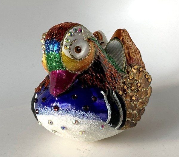 JAY STRONGWATER HOLIDAY MANDARIN DUCK CHRISTMAS GLASS ORNAMENT: JAY STRONGWATERCHRISTMAS GLASS ORNAMENTMANDARIN DUCKHand-painted in a rich colorful palette, this piece sparkles with added glitter and a sprinkling of Swarovski gems.Dimensions6.5" Wide x 3.5" Deep x