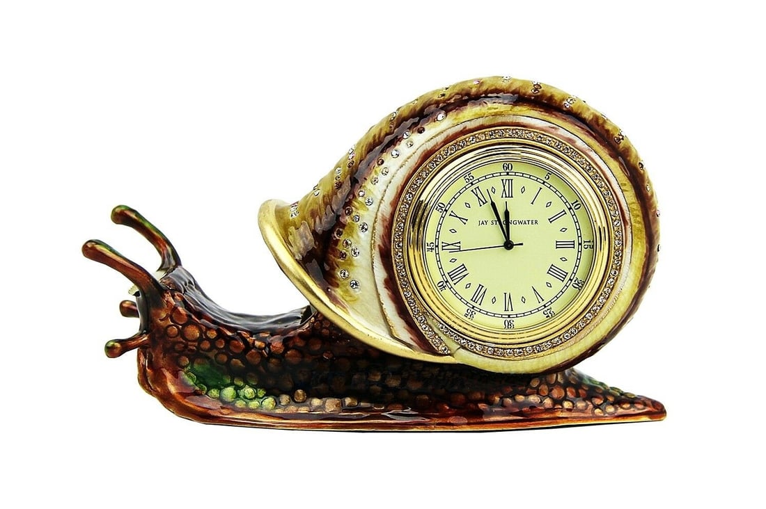 JAY STRONGWATER ANDREE SNAIL TAPE DISPENSER & CLOCK: JAY STRONGWATER LARGE SNAIL TAPE DISPENSER WITH CLOCK. From GREAT GIFTS Collection. Name: ANDREE. Color: NATURAL. Hand painted Enamel Over Metal, Hand Set Multi-Color Swarovski Crystals. 6" Long x 2"