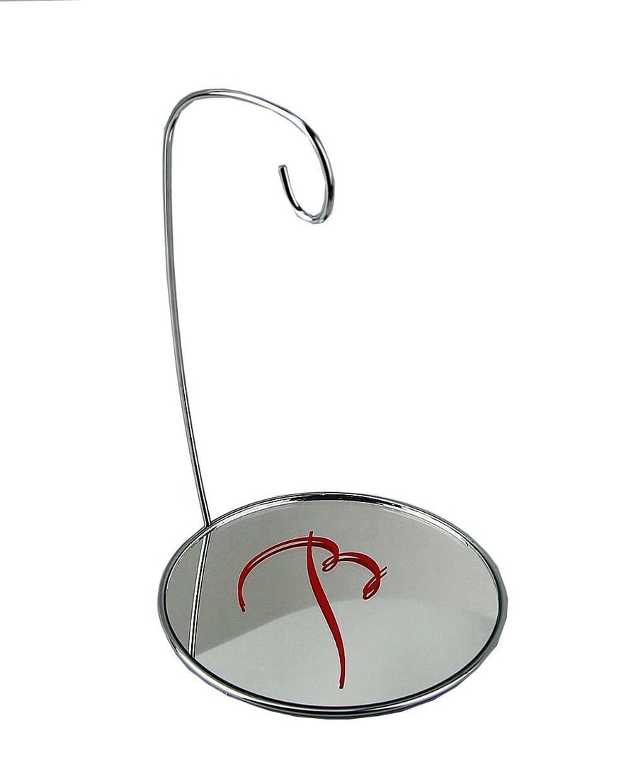 BACCARAT ORNAMENT / JEWELRY MIRROR STAND DISPLAY: BACCARATMIRROR ORNAMENT OR JEWELRY STAND, DISPLAYA long-standing tradition of excellence in exquisitely crafted crystal and glassware.It is approximately: 5.25" Base Diameter x 8" Tall