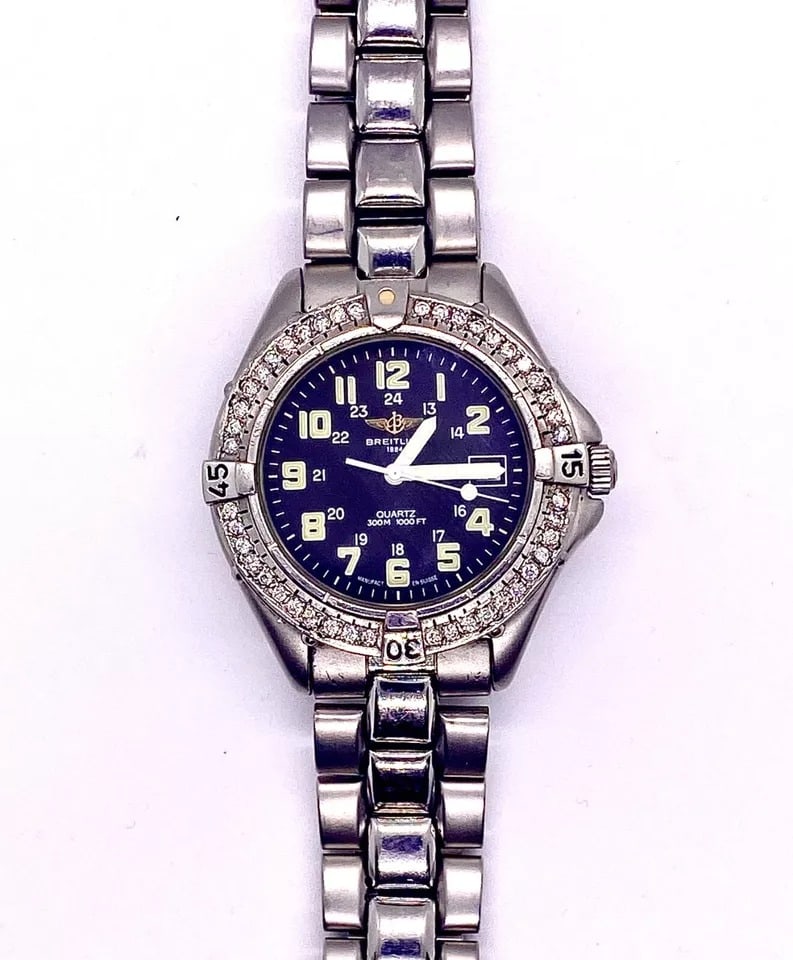 Breitling Colt 44mm Diamond Bezel Automatic Watch St. Steel Band Box #63Breitling Colt 44mm Diamond: Breitling Colt 44mm Diamond Bezel Watch #63Features:- Ref. A57035- Stainless steel band- Original black dial- Diamond bezel- Automatic Movement- Date indicator - Fits up to 7.25" wristComes with