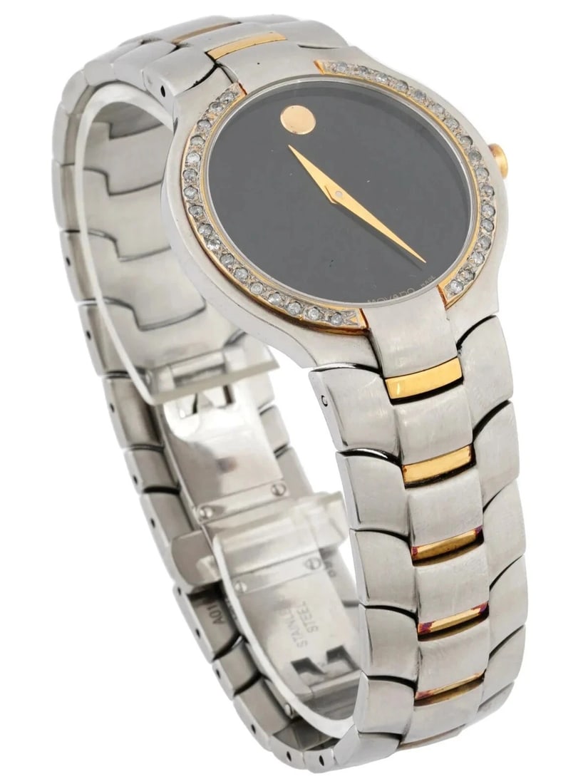 MOVADO SWISS STAINLESS STEEL DIAMONDS BAZEL WRIST WATCH: MOVADO TWO - TONE SWISS MADE STAINLESS STEEL and 14 K Gold DIAMONDS BAZEL 36 mm.UNISEX WRIST WATCH Great Working Condition 100% Authentic # 10A Movado Swiss Made stainless steel ladies wrist watch. Fe