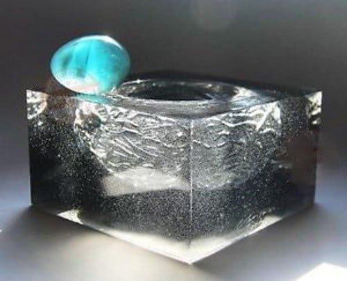 DAUM CRYSTAL GRAY NEST BOWL WITH BLUE EGG: DAUM.DAUM CRYSTAL CLEAR GRAY NEST BOWL WITH BLUE/GREEN EGG.LIMITED EDITION WORLDWIDE.SIZE: 6 1/2" Square x 3 1/2" Tall.Egg is 2 1/2" Long.DEFINITELY A CENTERPIECE! Made By Hand, Kiln Fired For 10 Days