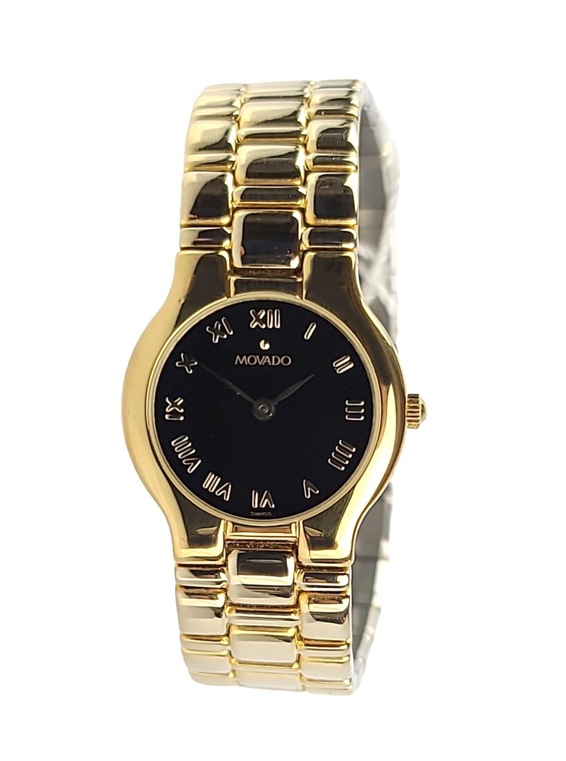 MOVADO SWISS QUARTZ WATCH CLASSIC GOLD PLATED BLACK DIAL: MOVADO CLASSIC EDITION100% BRAND NEW, NEVER WORN100% AUTHENTICCLASSIC DIAL DESIGNCOMES IN ORIGINAL MOVADO BOX WITH NO PAPERSCase & Bracelet: Gold Plated Stainless steelCaseback: SnapBezel: Stainless s