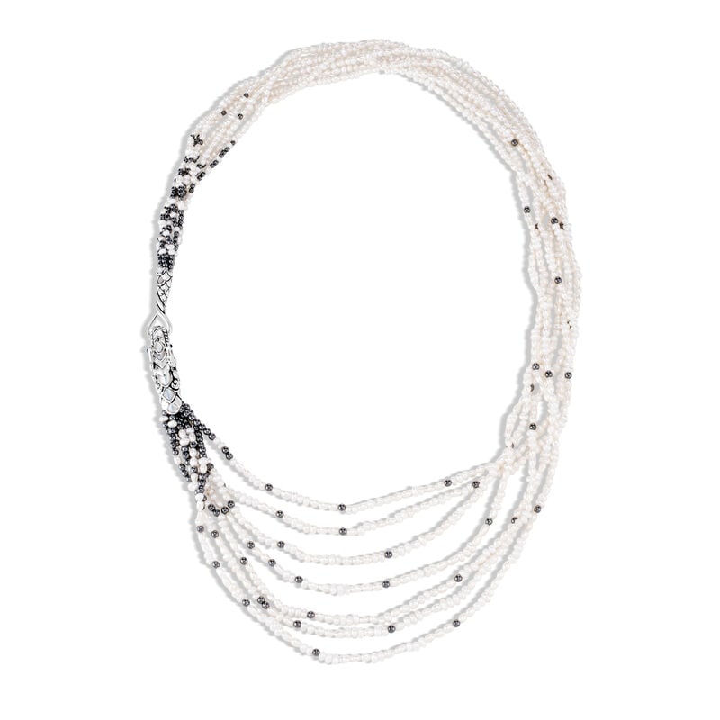 John Hardy Legends Naga Layered 7-Row Pearl Necklace 18" Long: John Hardy necklace from the Legends Collection. Sterling silver hardware and Naga dragon station. Seven strands of pearls and hematite beads. Naturally white freshwater cultured pearls. Pearl size: 2