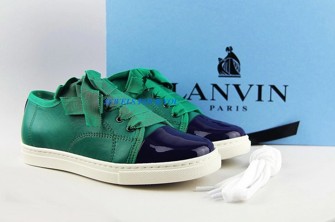 LANVIN SUPER COMFORTABLE LUXURY GIRL'S GREEN & BLUE SHOES SZ 32EU ITALY # 21 NEW: LANVIN100% BRAND NEW, 100% AUTHENTICIN ORIGINAL LANVIN BOXTOP MADE ON 100% FINEST LAMBSKIN LEATHER & PATENT LEATHERRUBBER SOLEHAS SPARE WHITE SET OF LACESZIPPER ON A SIDEEXTREMELY COMFORTABLE!Color: G